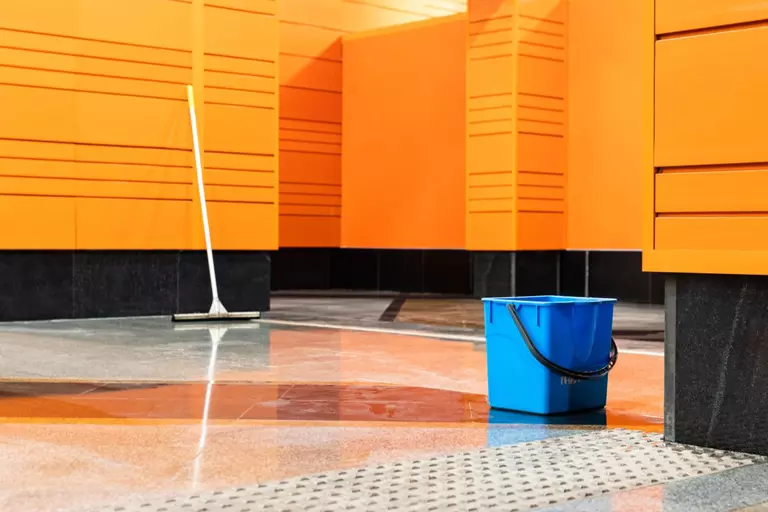 Commercial cleaning supplies in a workspace